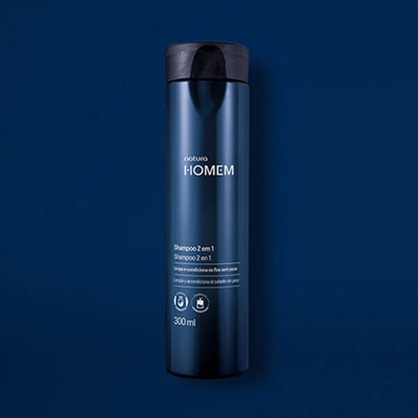Imagem em fundo azul escuro com um Shampoo Masculino 2 em 1 Natura Homem.