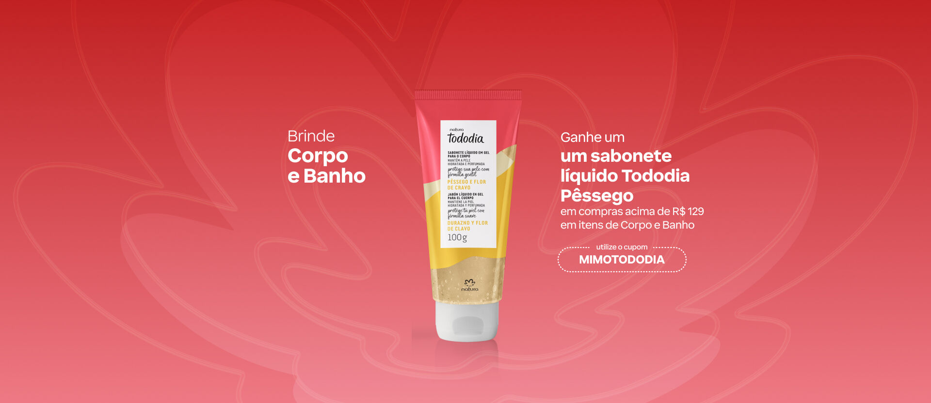 Banner rosa com fundo floral. Destaca a bisnaga de sabonete líquido Natura Tododia Pêssego e Flor de Cravo 100g e a oferta de brinde acima de R$ 129 em Corpo e Banho com cupom MIMOTODODIA.