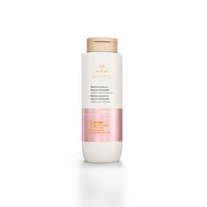 Shampoo Natura Lumina Restauração e Liso Prolongado em fundo branco.