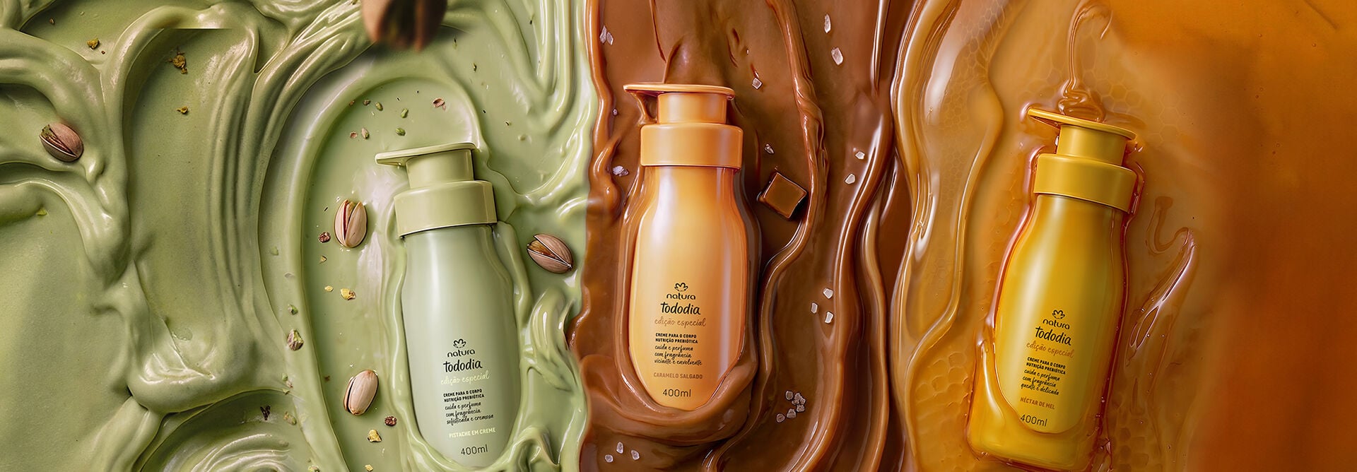 Três frascos de hidratante Natura Tododia imersos em fundos cremosos correspondentes às suas fragrâncias: Pistache em creme verde, Caramelo Salgado em marrom e Néctar de Mel em amarelo âmbar.