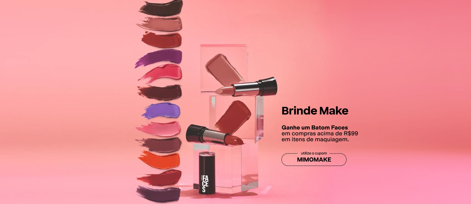 Banner de fundo rosa com batons "Brinde Make: Ganhe um Batom Faces em compras acima de R$ 99 em itens de maquiagem.. Utilize o cupom: MIMOMAKE." 
