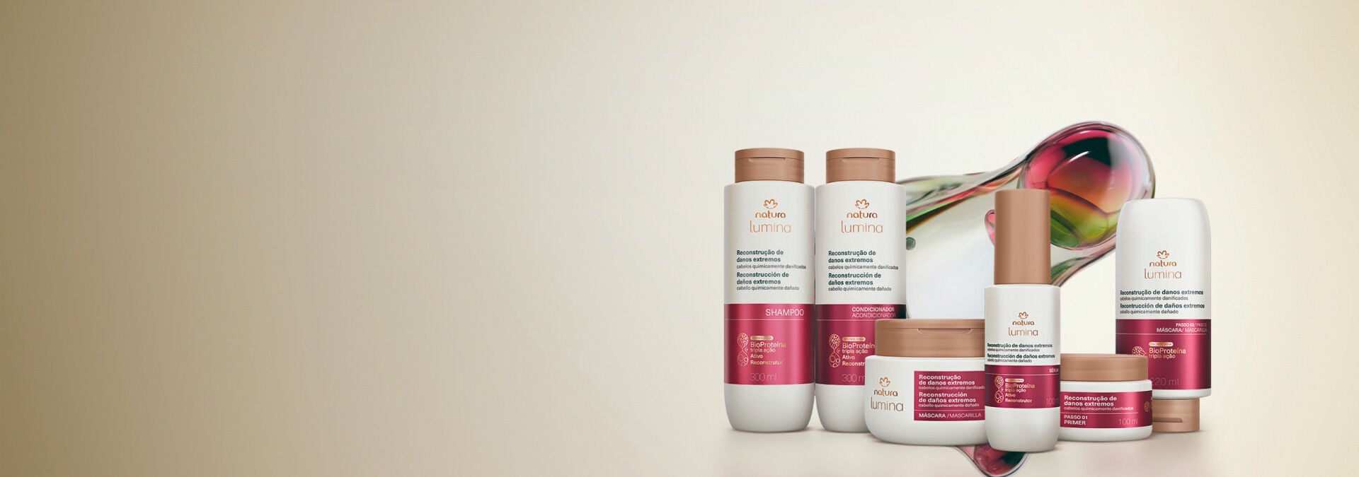 Fundo claro com linha Natura Lumina Reconstrução de Danos Intensos à esquerda e partícula que destaca a tecnologia do produto.