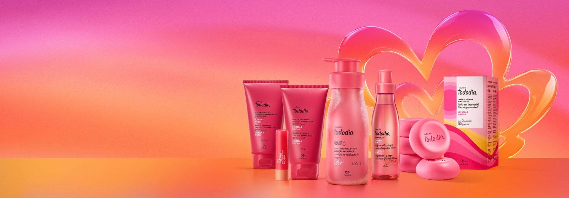 Imagem com os produtos da linha Tododia Verão Acerola e Hibisco: Bronzer Iluminador Corporal, Balm Labial, Creme Sorbet Desodorante Nutritivo para o Corpo e Body Splash.