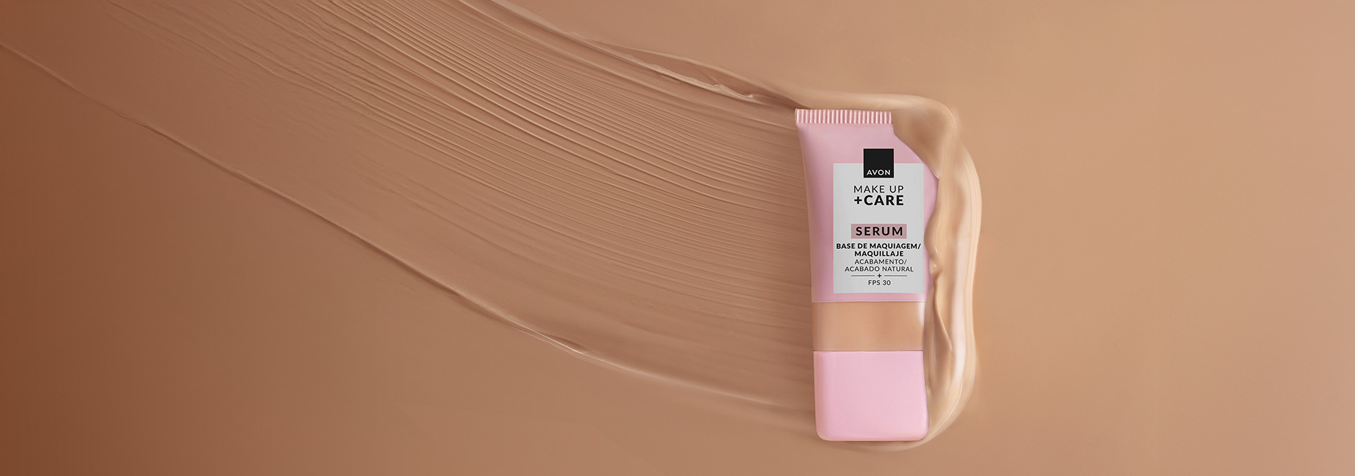 Banner em tons de marrom com textura suave e um tubo de base Avon Make Up + Care Serum. O texto destaca "Base" e menciona cobertura impecável e conforto para a pele em qualquer ocasião.