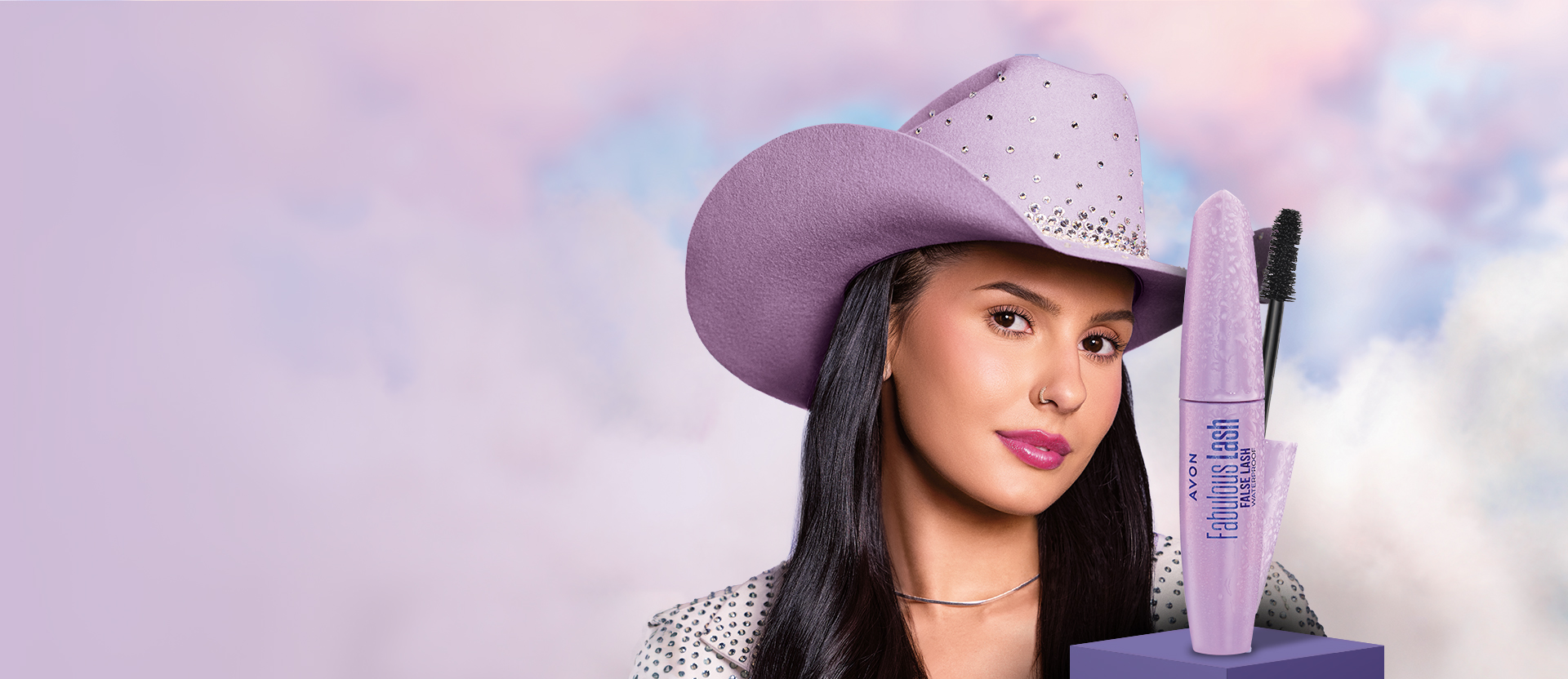 Banner com fundo em tons de roxo e rosa. Destaca Ana Castela e a nova Máscara Fabulous, que promete efeito cílios postiços com duas vezes mais volume.