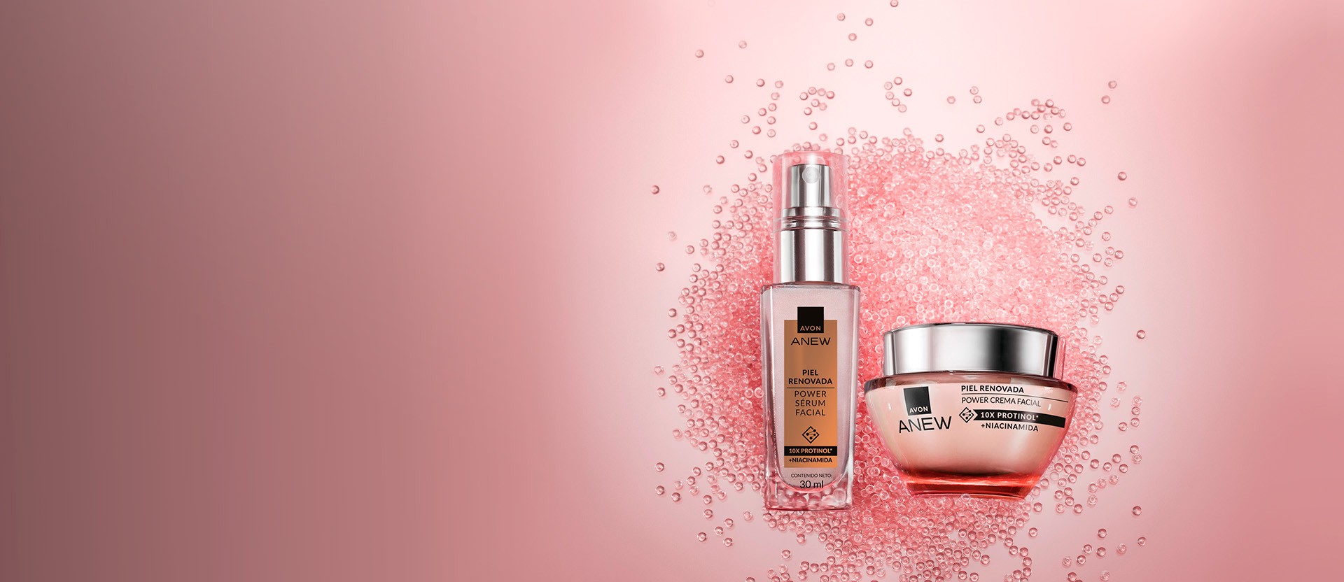 Banner animado con fondo rosa y esferas decorativas. En primer plano, serum y crema facial. Texto: "Conoce nuestro nuevo sitio con un diseño más moderno, ágil y pensado para brindarte lo mejor".