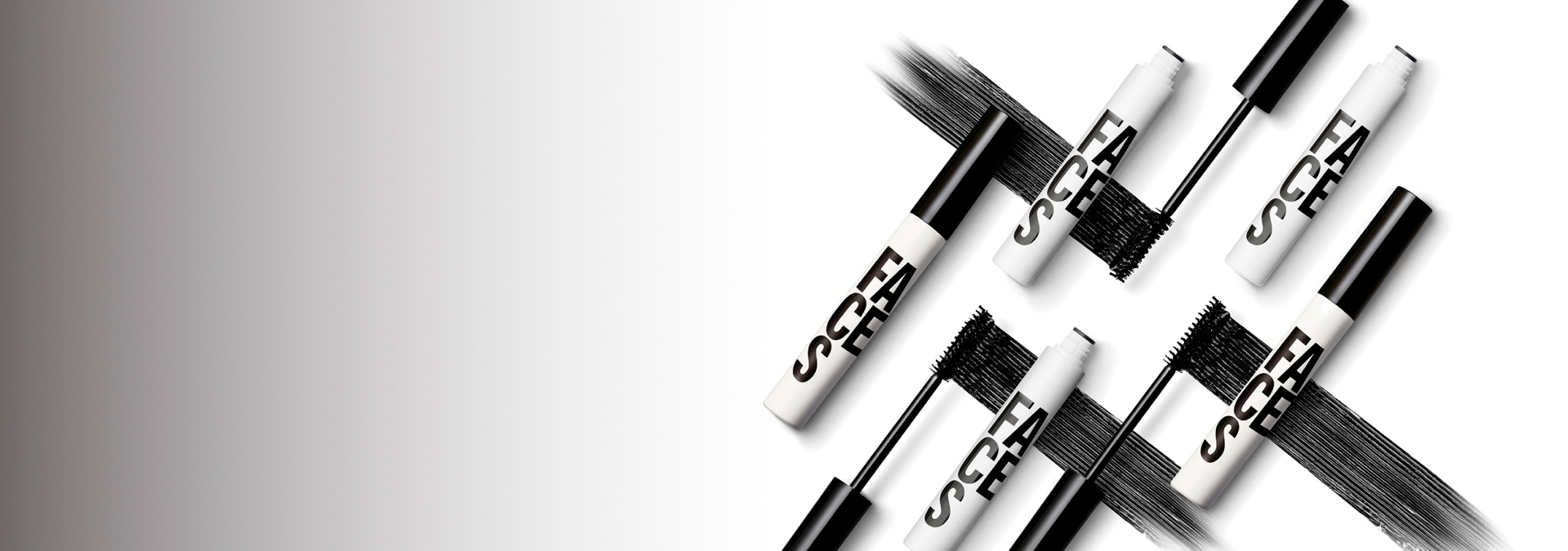 Imagem com fundo degradê branco e preto e ao lado direito algumas máscaras de cílios com textura na cor preta.
