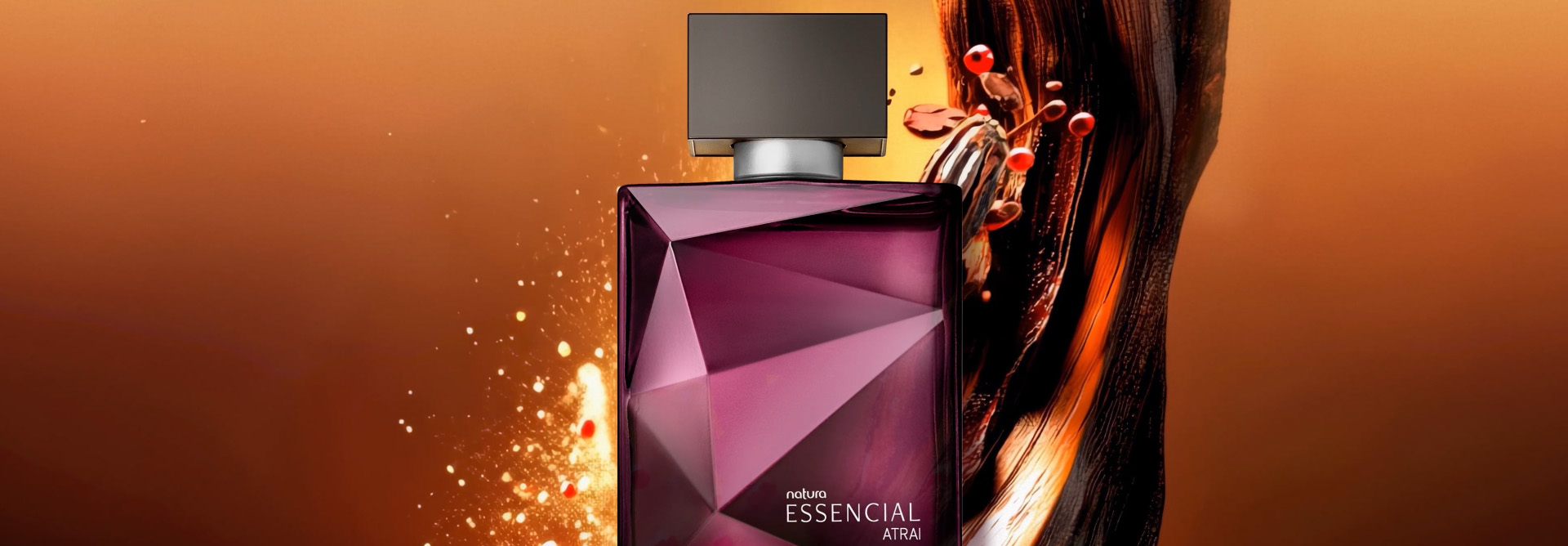 Fragrância Natura Essencial Atrai Masculino sobre ingredientes naturais e amadeirados em fundo em tons terrosos e em cor de laranja.