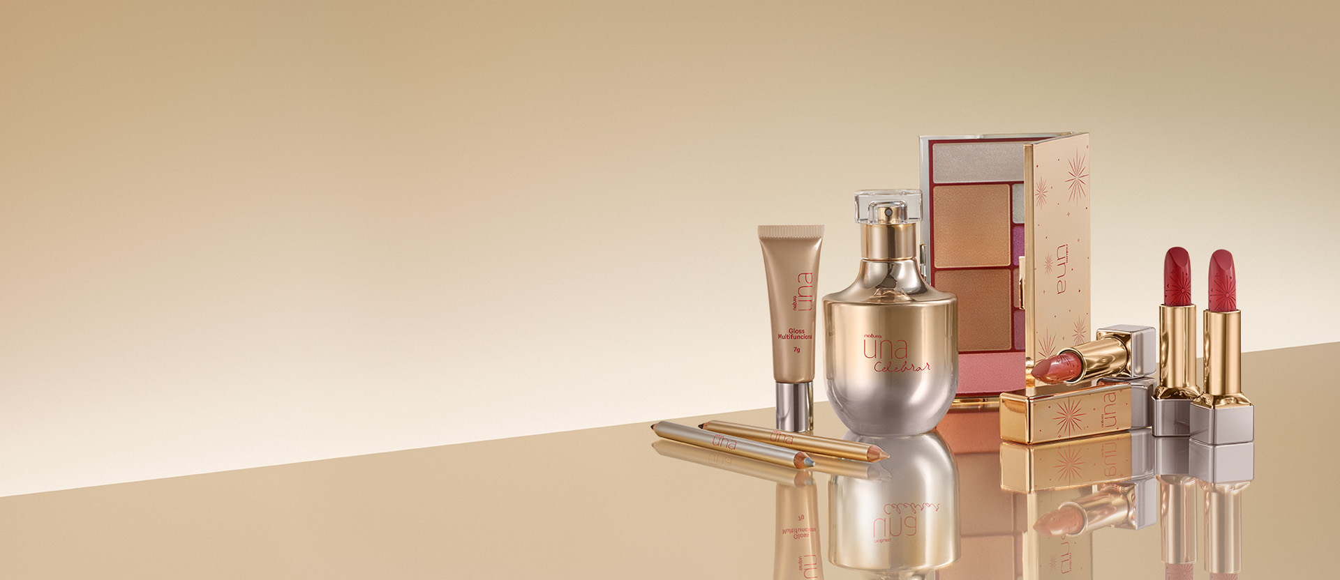 Coleção de maquiagem e perfume Una Celebrar da Natura em um fundo dourado reflexivo