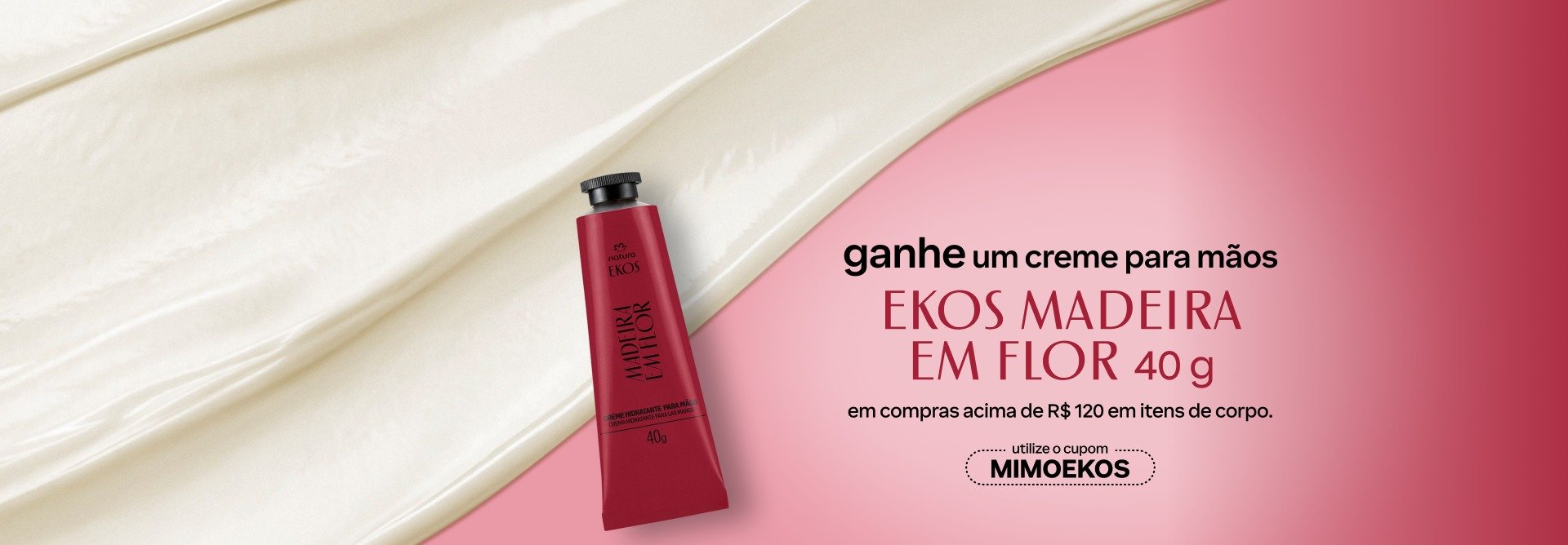 Bisnaga de Creme para Mãos Ekos Madeira em Flor com texto: ganhe um creme para mãos Ekos Madeira em Flor 40 g em compras acima de R$ 120 em itens de corpo. Utilize o cupom MIMOEKOS. Fundo avermelhado com textura cremosa.