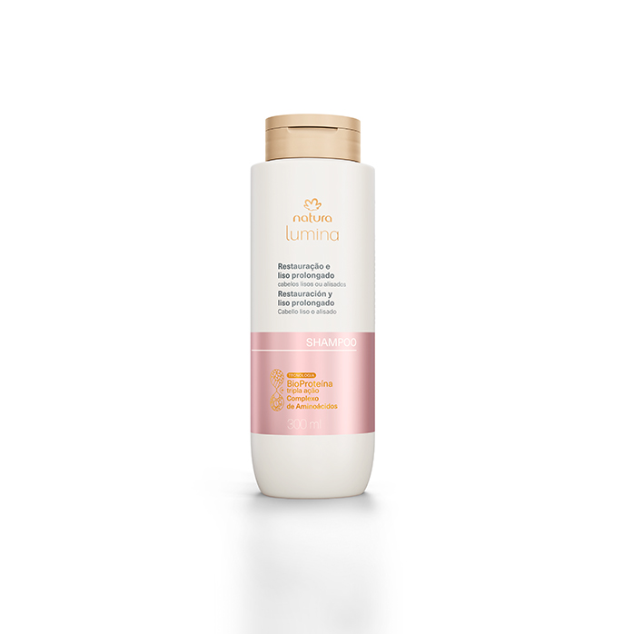 Shampoo Natura Lumina Restauração e Liso Prolongado em fundo branco.