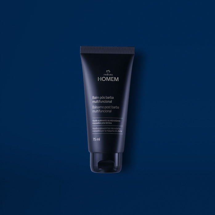 Balm Pós-barba Multifuncional Natura Homem sobre fundo azul escuro.