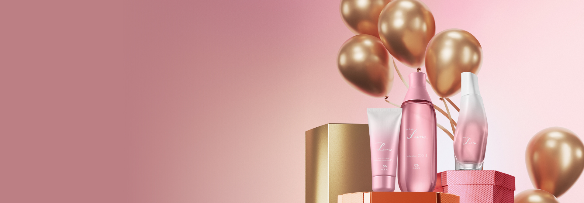 Itens de Natura Luna, incluindo um Desodorante Colônia, um Body Splash e um Creme Hidratante Perfumado para Mãos. Os itens estão sobre caixas de presente com balões de festa ao fundo.