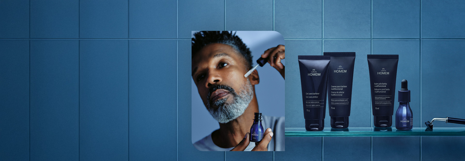 Foto de 4 produtos de Natura Homem, incluindo um gel para barbear, um creme para barbear multifuncional, um balm pós-barba e um óleo para barba. Ao lado, um homem aplicando o óleo na barba.