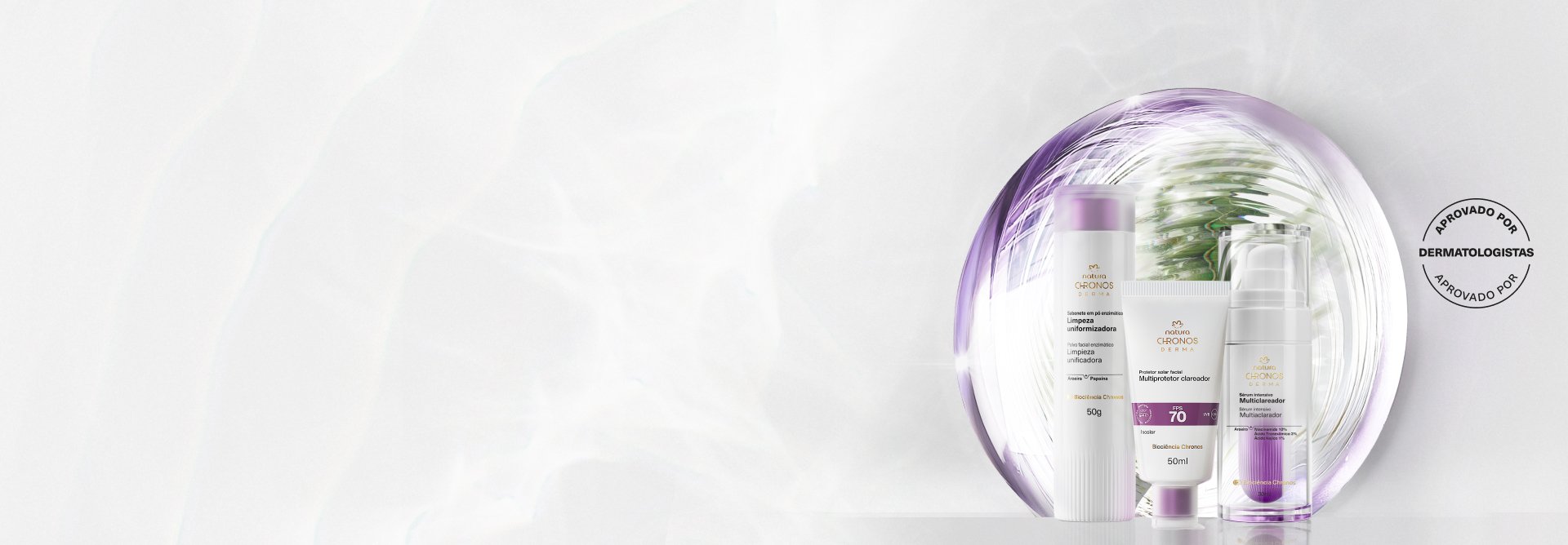 Sabonete em Pó Enzimático Limpeza Uniformizadora, Multiprotetor Clareador FPS 70 e Sérum Intensivo Multiclareador envoltos por esfera translúcida roxa, em fundo branco com selo Aprovado por Dermatologistas. 