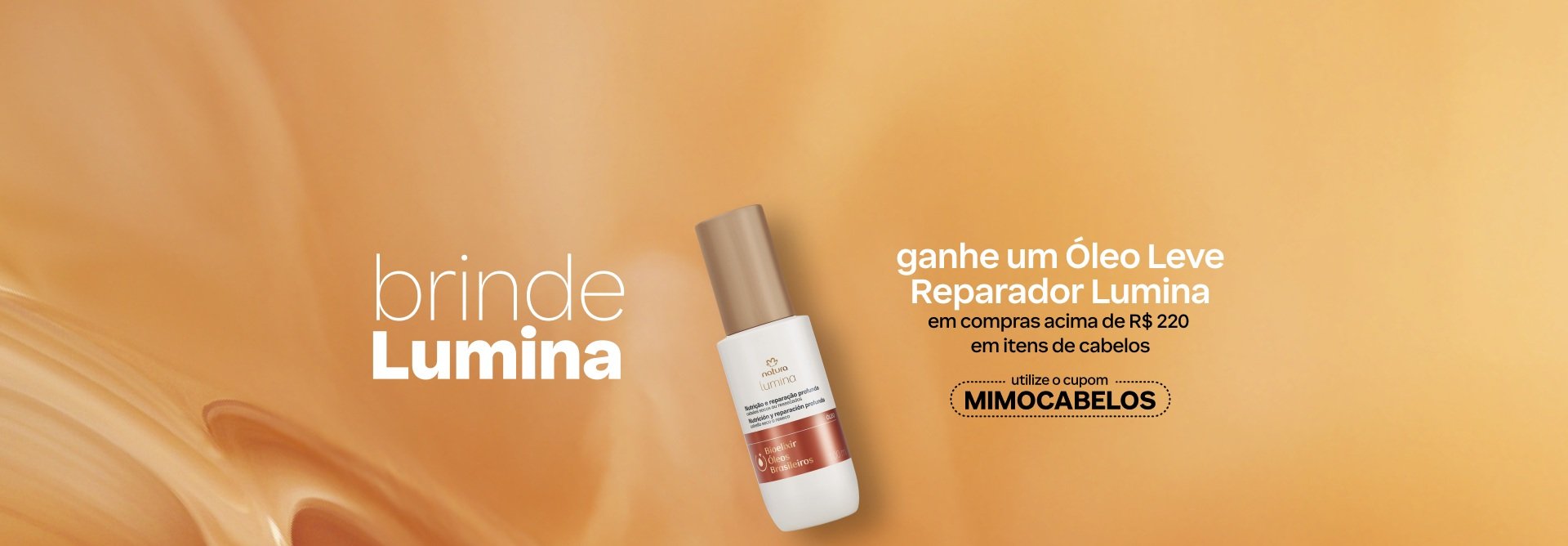 Óleo Leve Reparador Lumina Nutrição e Reparação Profunda em frasco branco com tampa bege e rótulo laranja. Está sobre fundo laranja com o texto: brinde Lumina. Ganhe um Óleo Leve Reparador Lumina em compras acima de R$ 220 em itens de cabelos. Utilize o cupom MIMOCABELOS.