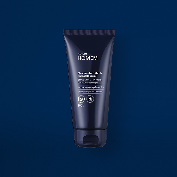 Novo Shower Gel 4 em 1 Natura Homem aparece em destaque no centro da tela sobre fundo azul-marinho.