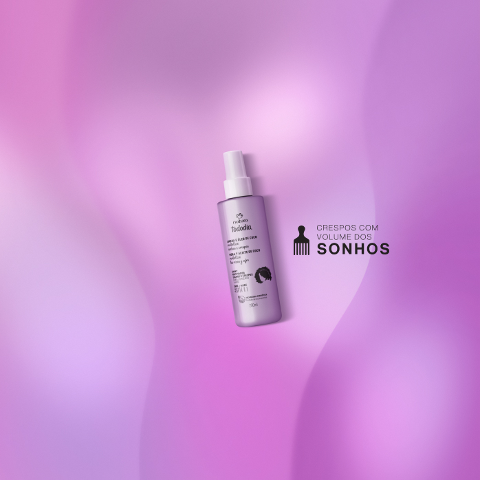 Spray Reativador Natura Tododia Cachos e Crespos,  em fundo roxo, com selo Crespos com volume dos sonhos.