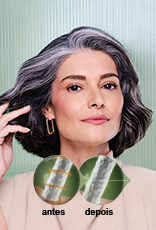 Mulher branca de cabelos médios e grisalhos usa blusa bege e brincos quadrados dourados, em fundo verde com listras verticais. À frente, representações do fio de cabelo antes e depois.