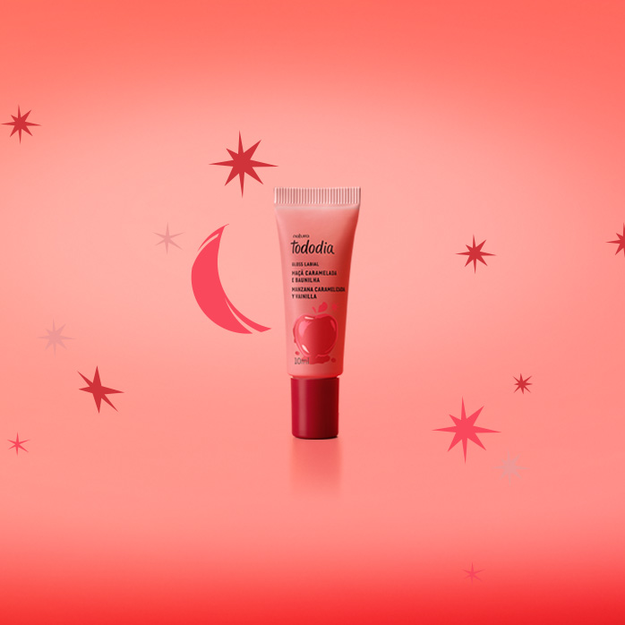Gloss Natura Tododia em fundo em tons de vermelho com ilustrações de estrelas e lua.