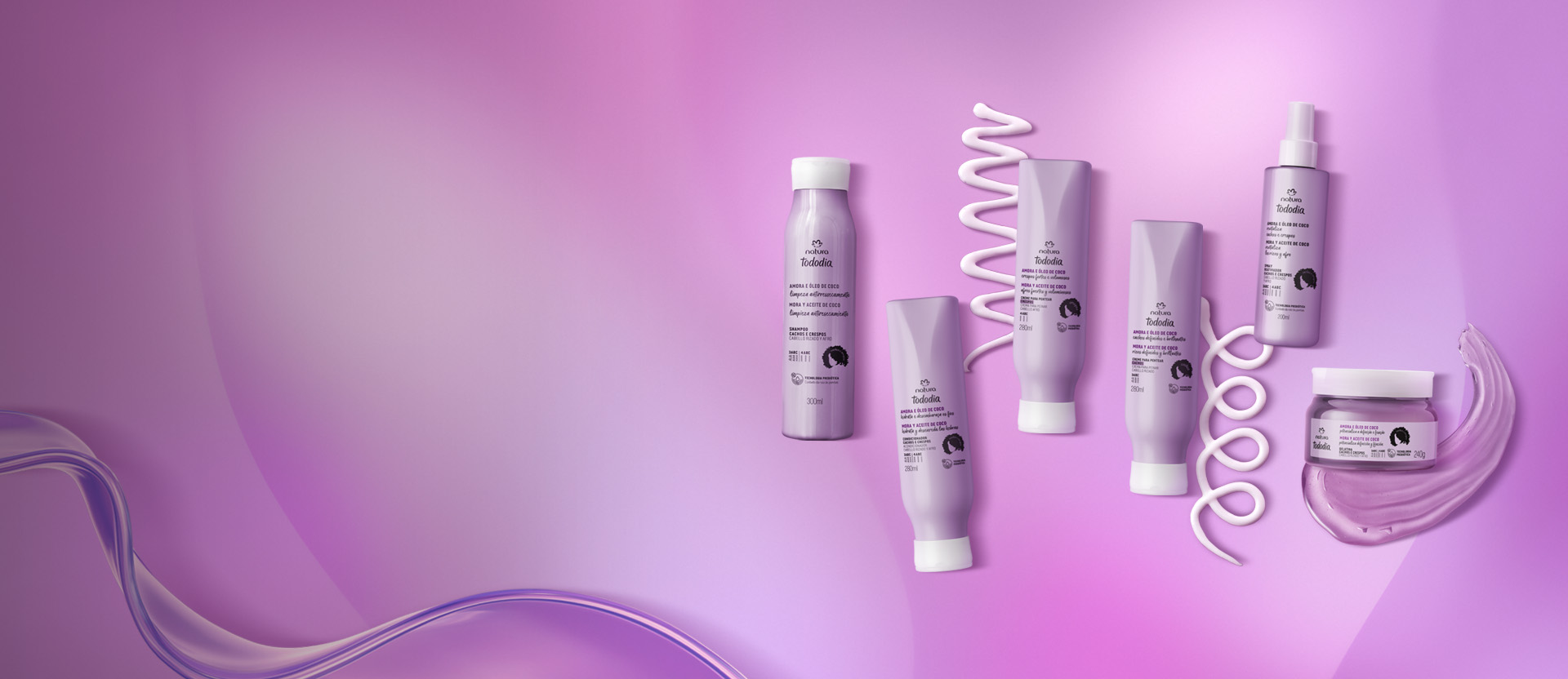 Banner con fondo rosa, se exhiben productos de la nueva línea Tododia para cabello rizado. Incluye shampoo, acondicionador y crema. Texto: Hasta 30% OFF en productos que cuidan tus rizos.