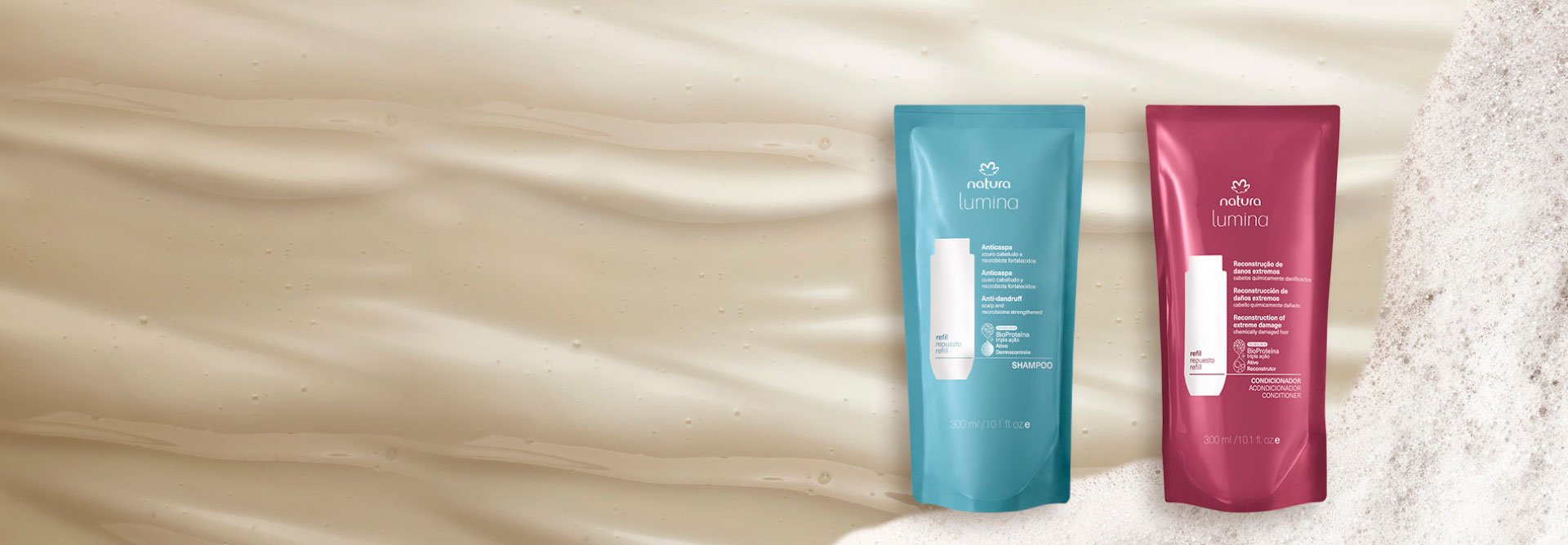 Dos repuestos de productos Lumina sobre un fondo texturizado con espuma y textura cremosa.