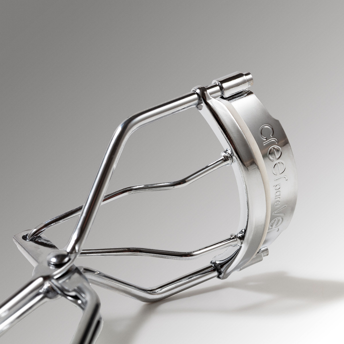 Arqueador de Pestañas Creer para Ver